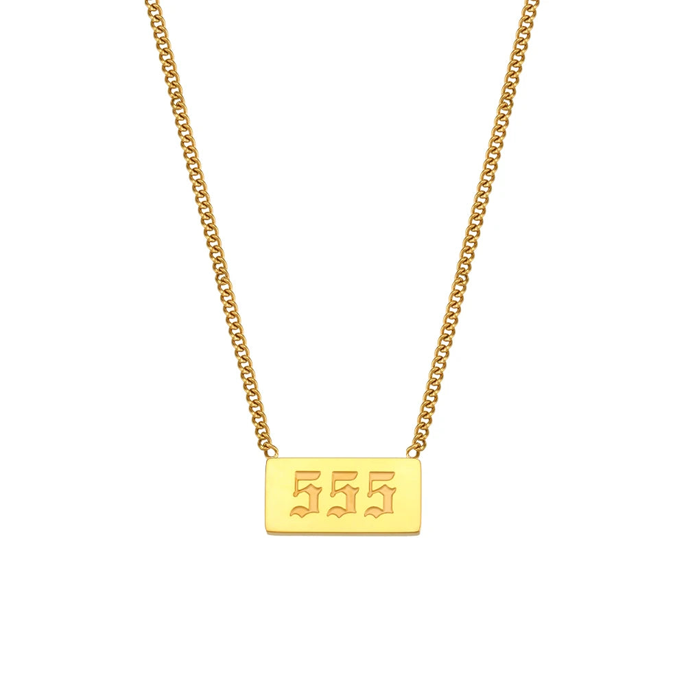 Gold necklace with a rectangular pendant displaying '555' on a white background