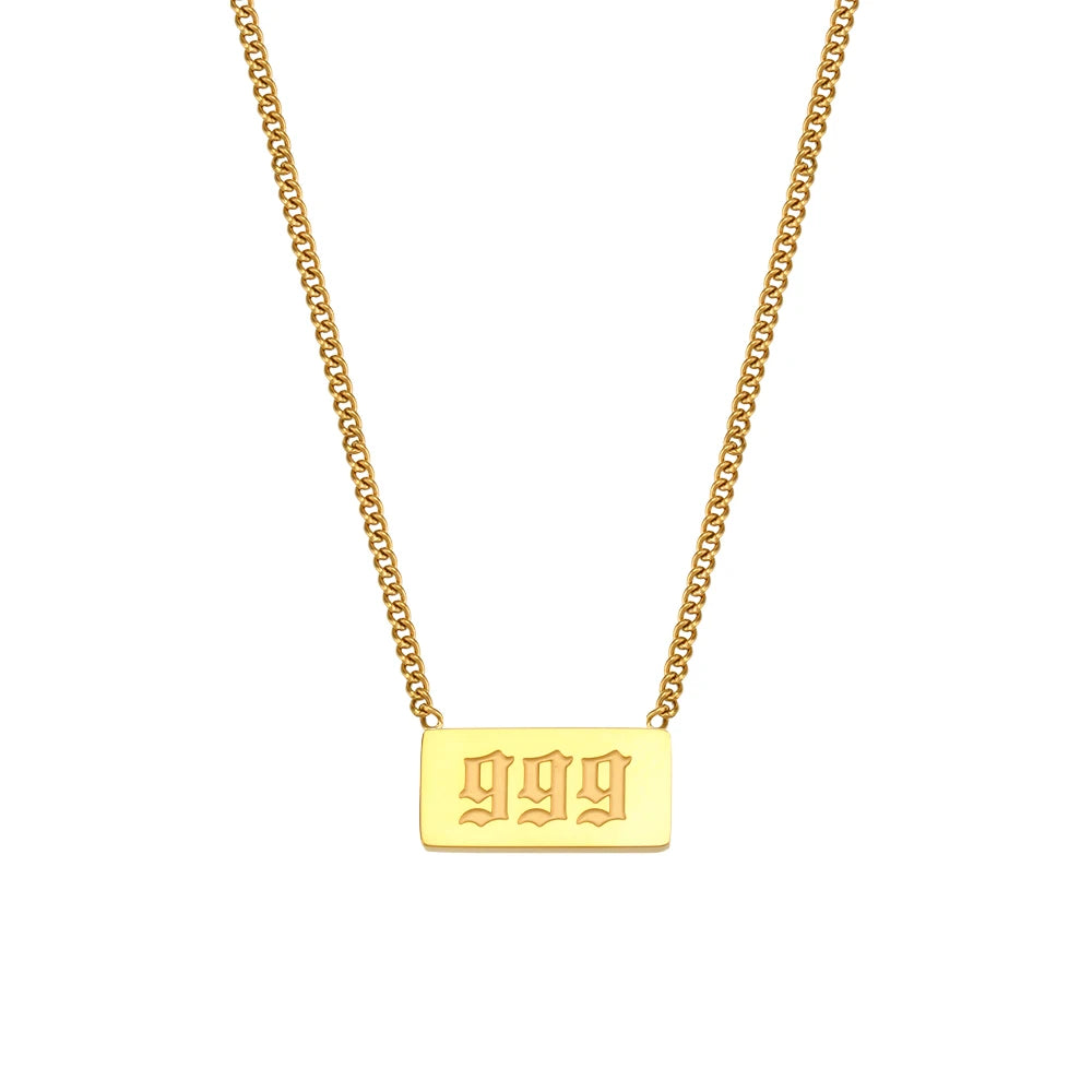 Gold necklace with a rectangular pendant displaying '999' on a white background