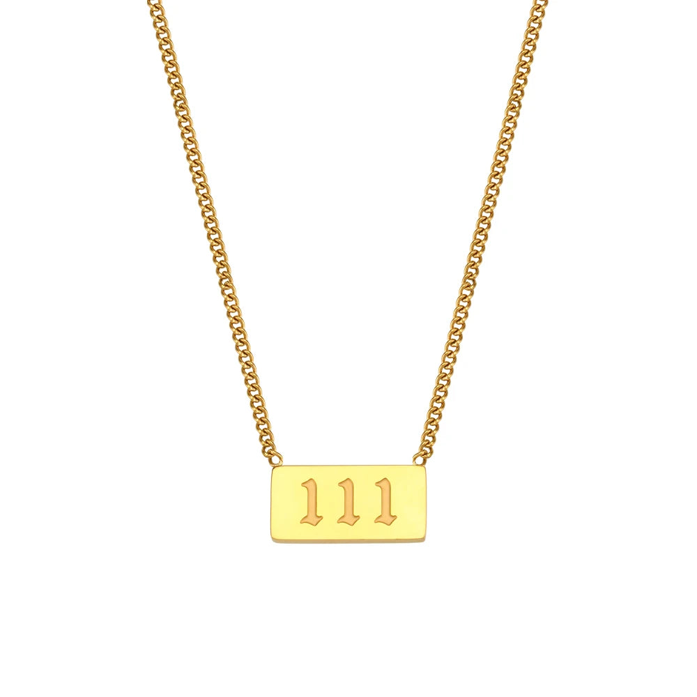 Gold necklace with a rectangular pendant displaying the number '111' on a white background