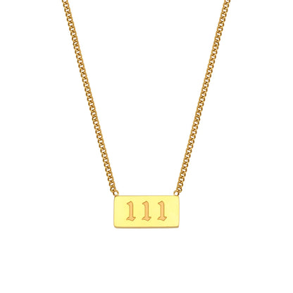 Gold necklace with a rectangular pendant displaying the number '111' on a white background